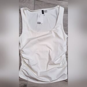 Divided White Tank Top With Rauching On Sides